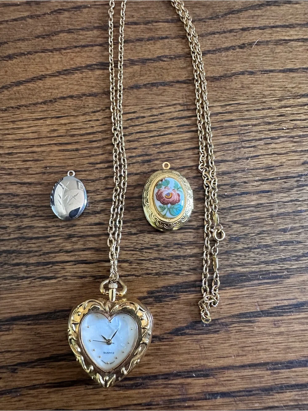 Trio of Gold Heart Pendant Watch Necklace with 2 Floral Lockets.  Vintage